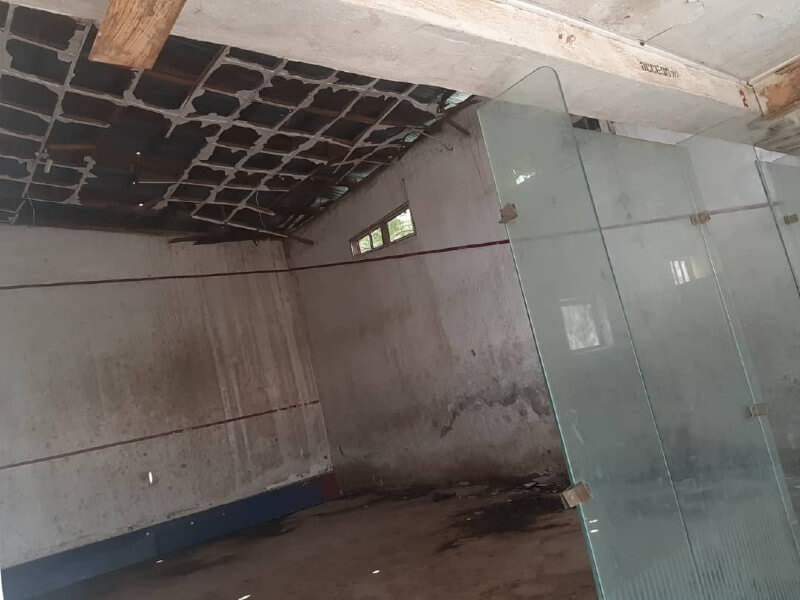 *  Dilapidated Squash Court at David Mark road, Minna