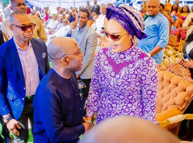 Governor Alex Otti (left) being received on arrival at the Thanksgiving Church service by Hon. Nkeiruka Onyejeocha (right), Nigeria's Minister of State for Labour and Employment.  