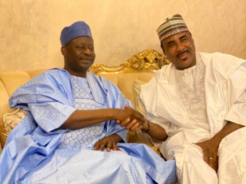 Immediate past Governor of Gombe State, Ibrahim Hassan Dankwambo, in a warm handshake to welcome Dr. Jamilu Isyaku Gwamna.
