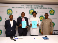 *  Executive Secretary, NCDMB, Engr. Simbi Wabote and Managing Director, BOI, Mr. Pitan Olukayode in a group photograph with some management and staff of the Board after launching the $50m fund for NOGAPS Manufacturing Product Line in Lagos on Wednesday