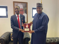 *  L-R: Chairman, Economic and Financial Crimes Commission (EFCC), Mr. Abdulrasheed Bawa and the Executive Vice Chairman/CEO, Nigerian Communications Commission (NCC), Prof. Umar Garba Danbatta, during the presentation of an Ambassadorial badge for entrenching a culture of anti-corruption in the Communications industry to Danbatta, in Abuja.
