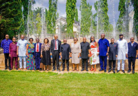 Governor Otti flanked on the right by the VC of Michael Okpara University of Agriculture Umudike, Prof Maduebibisi Iwe, and on the left by the Commissioner for Education, Prof Uche Eme-Uche, with other members of the university delegation and State Executive Council members in a group photograph.