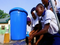Student washing their hands